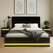 Modern bedroom with a black bed frame, white bedding, and yellow LED strip lights.