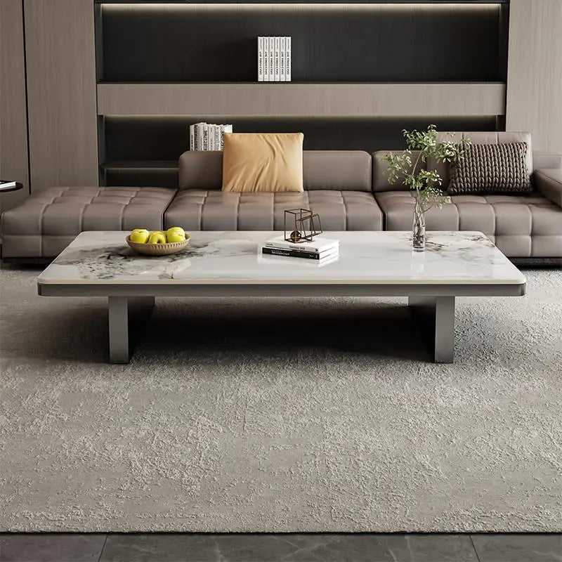 Modern living room with a gray sectional sofa and coffee table.