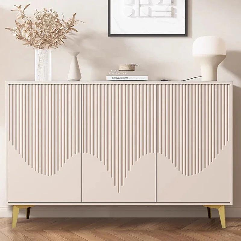 Beige sideboard with decorative elements in a room setting