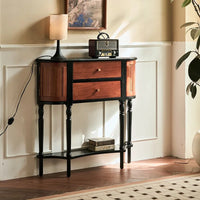 Wooden console table with black legs in a room setting