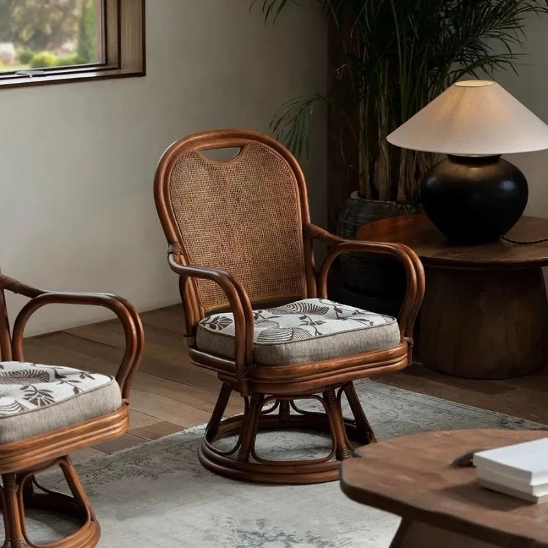 Rattan chair with patterned cushion in a cozy room setting