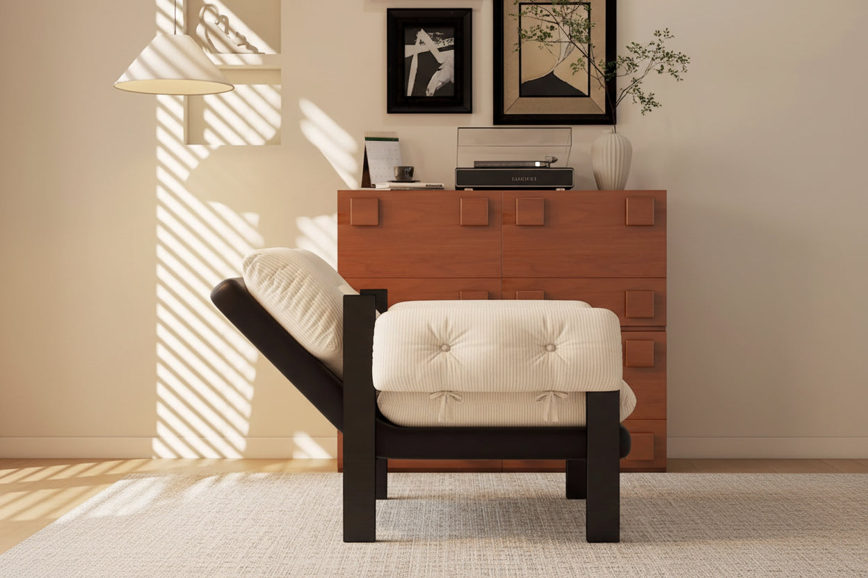 Armchair with adjustable backrest in a room setting, featuring text on adjustable features.