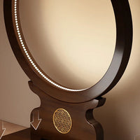 Round wooden lamp with LED ring light on a beige background