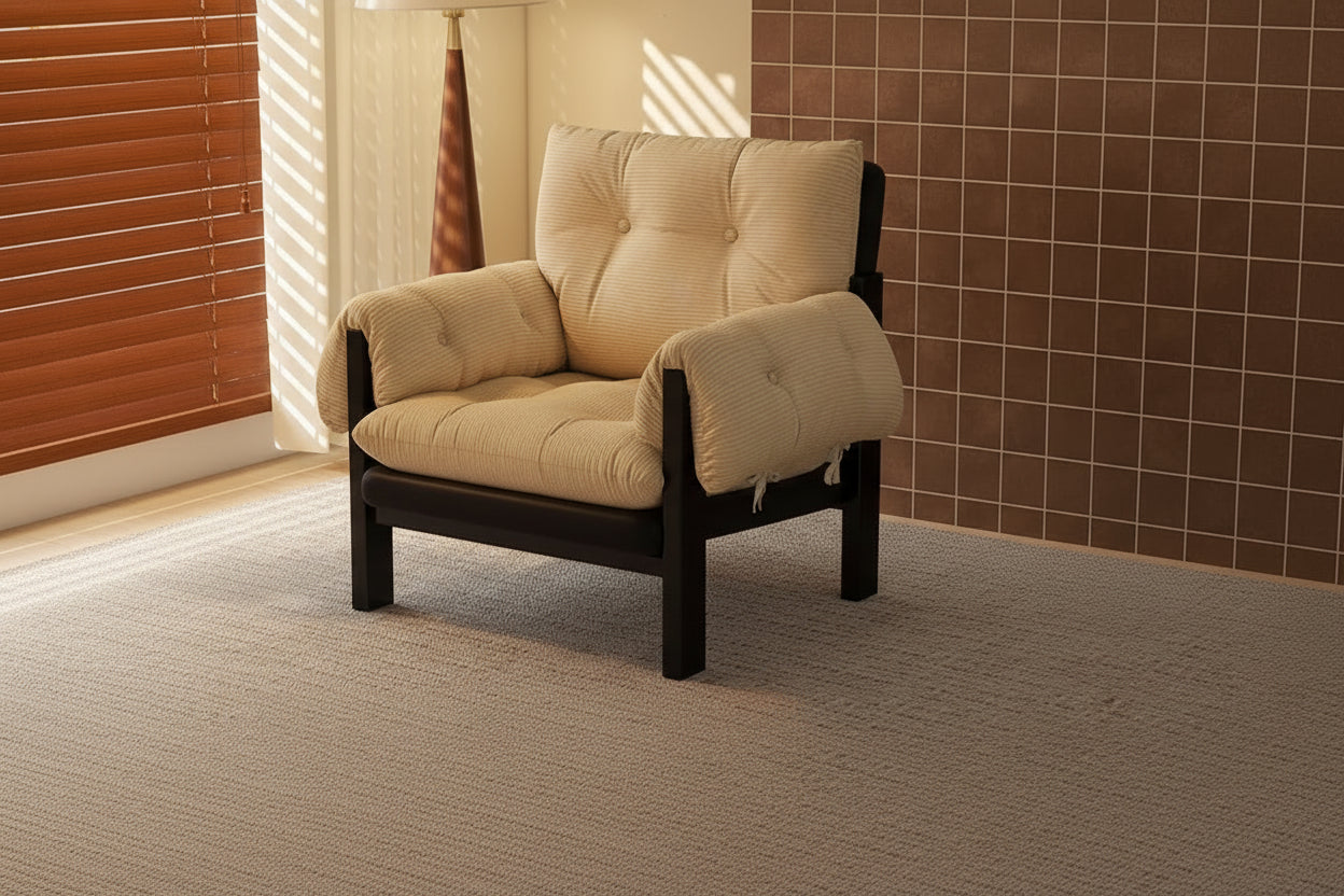 Beige cushioned chair with dark wooden frame in a room setting