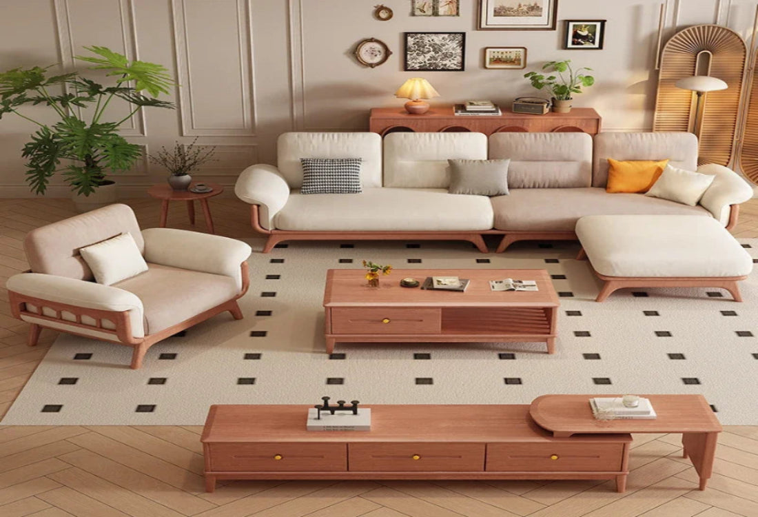 Living room with beige sofa, armchair, and wooden coffee tables.