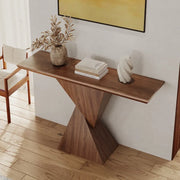 Wooden console table with decorative items in a room setting