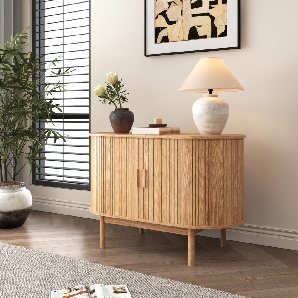 Wooden sideboard with decorative items in a living room setting