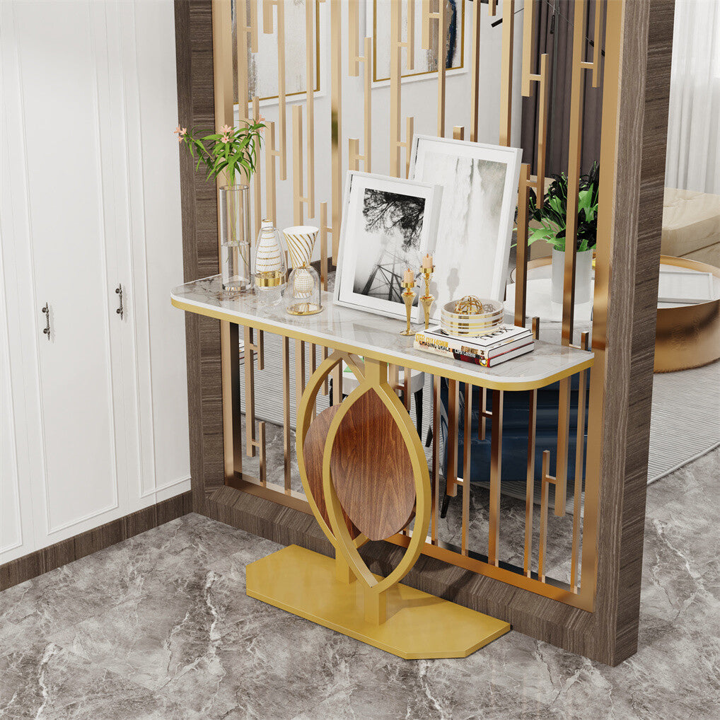 Decorative console table with marble top and gold accents in a room setting.