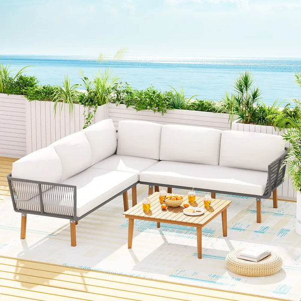 White outdoor sofa set on wooden deck - acacia & aluminium 5-seater outdoor sofa set setting