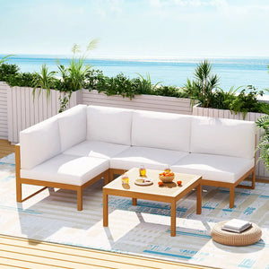 White outdoor sofa set on wooden deck