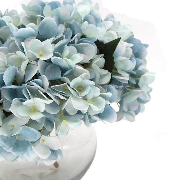 Artificial blue hydrangea with glass vase 23cm featuring delicate mixed blue petals