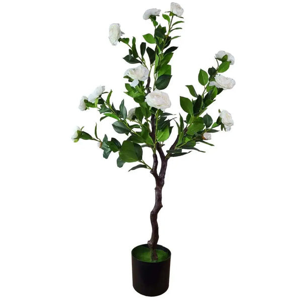 Artificial camellia tree with white flowers in black pot - close up view