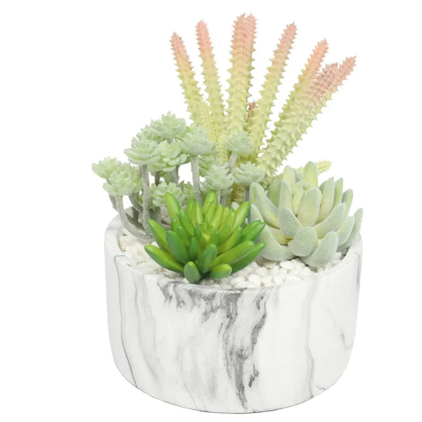 White marble planter with artificial succulents displayed in a 20.5cm bowl