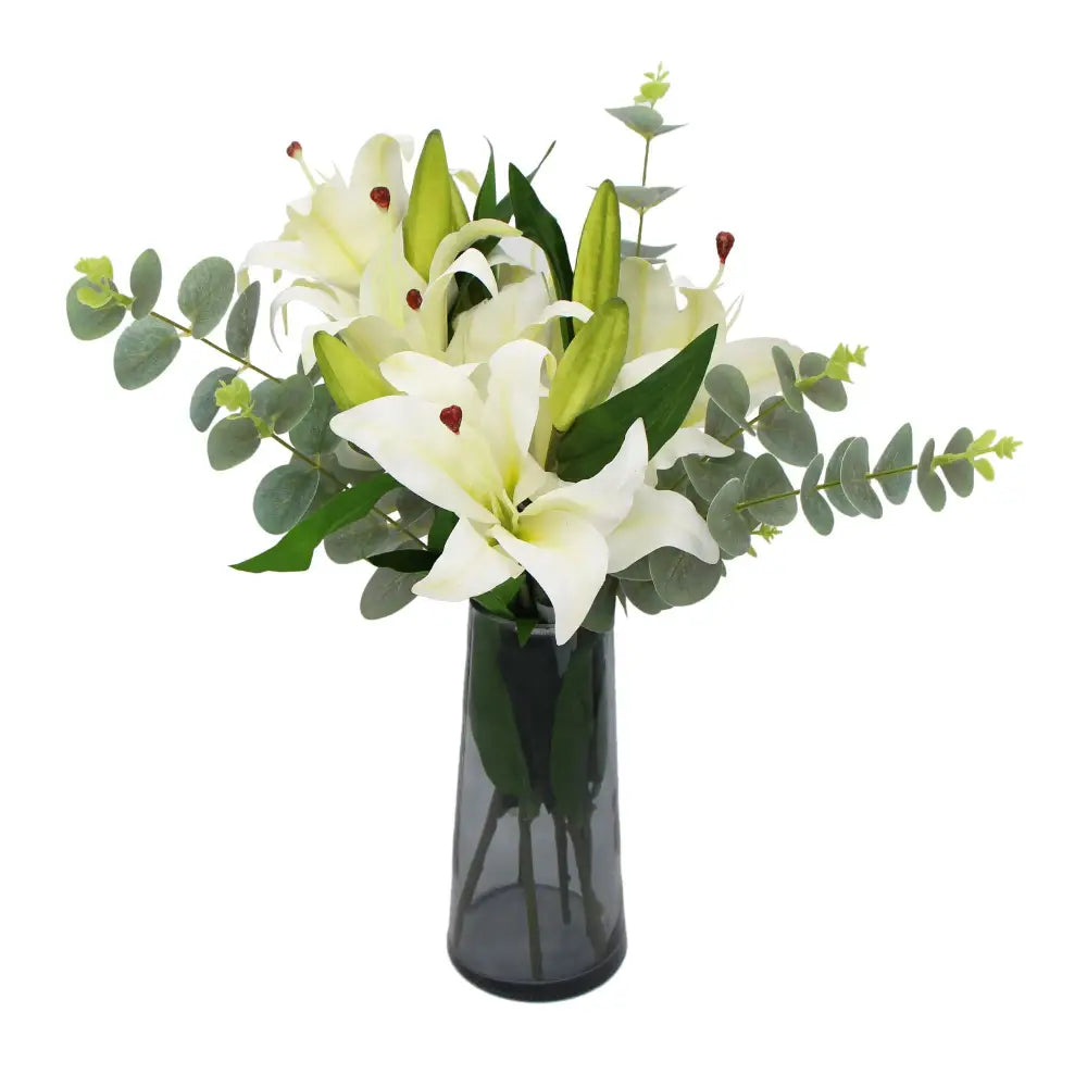 Beautiful artificial white lily flowers in glass vase 45cm