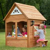 Backyard discovery aspen cubby house with children playing outside