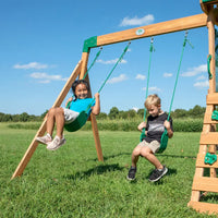 Two children playing on swings at backyard discovery buckley hill play centre