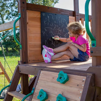 Backyard discovery cedar cove play centre with little girl on wooden slide