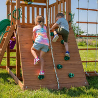 Young girl and boy playing on grayson peak play centre swing set, inspiring play options