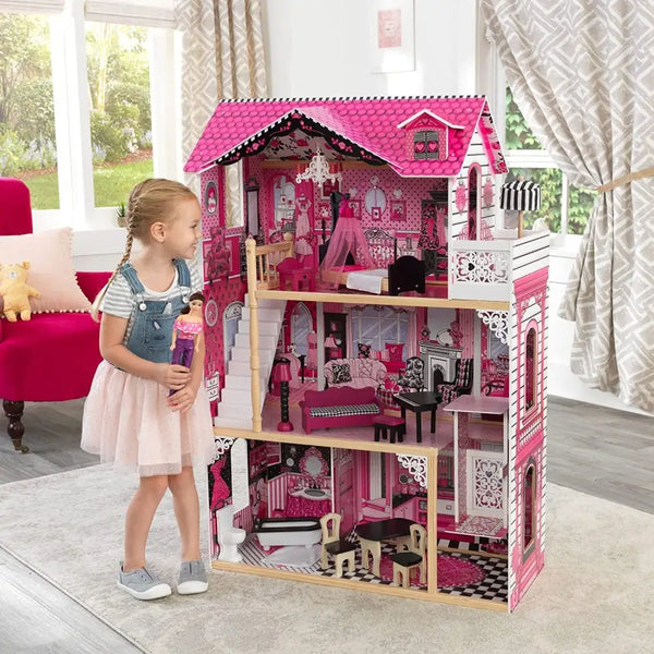 Little girl in front of pink dollhouse, dollhouse with furniture for kids 120 x 83 x 40 cm, four feet tall, included 15-piece