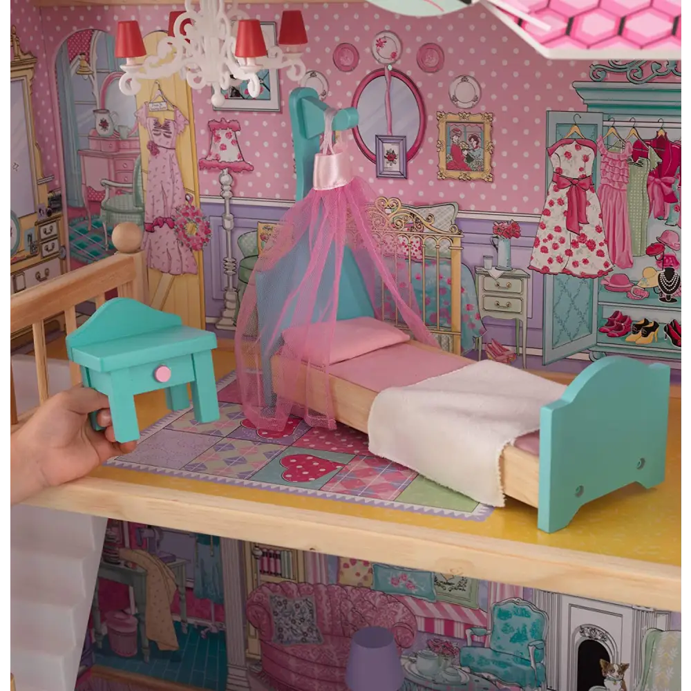 Child holding dollhouse with furniture for kids 120 x 88 x 40 cm (model 3), featuring four spacious rooms