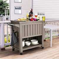 Outdoor bar serving cart with cooler on deck