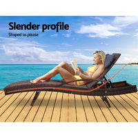 Woman relaxing on gardeon 2x outdoor sun lounges wicker beach with armrests, displaying the text ’slender