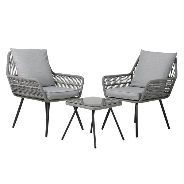 Outdoor bistro lounge set with grey wicker chairs and ottoman