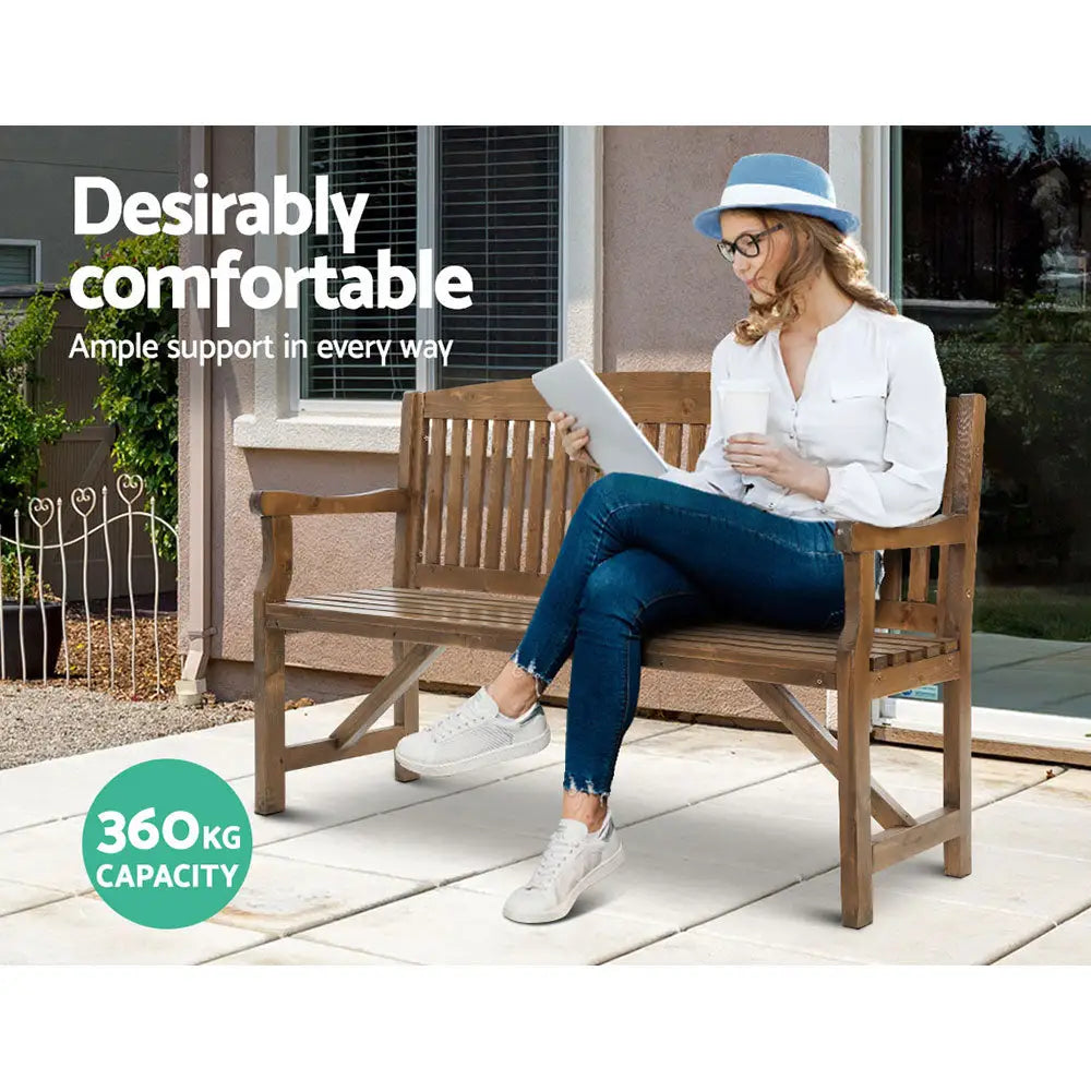 Gardeon 5ft outdoor wooden garden bench with woman using laptop