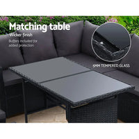 Gardeon 9 seater outdoor dining sofa set with laptop on table