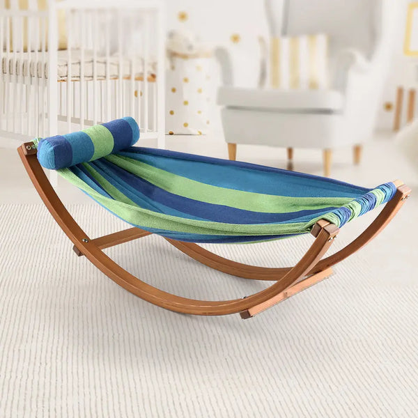 Colorful striped blanket on larch wood kids hammock rocking chair