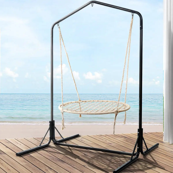 Gardeon hammock swing chair on wooden deck overlooking ocean
