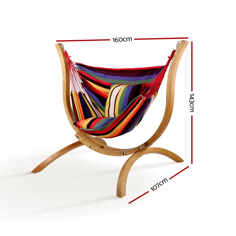 Gardeon rainbow hammock chair with wooden stand swaying gently amidst lazy sunday