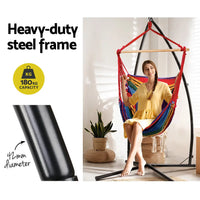 Gardeon hanging hammock chair with steel stand - rainbow: woman sitting in hammock chair