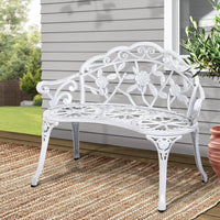 Gardeon outdoor garden bench seat 100cm cast aluminium vintage - a white bench on a patio