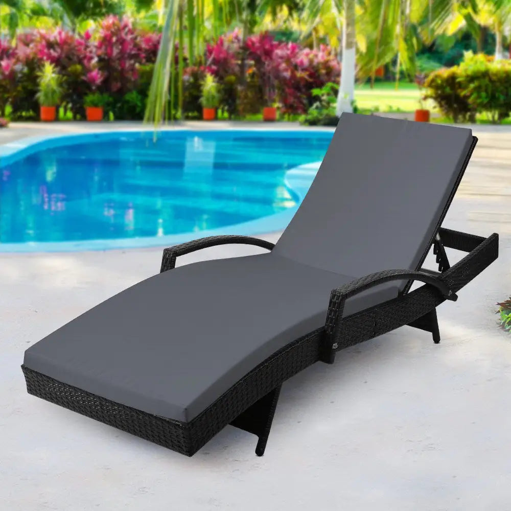 Gardeon sun lounge with cushion by poolside