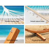 Gardeon timber hammock bed - tassel white on beach in close-up view
