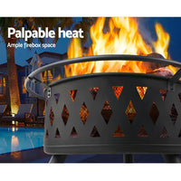 Grillz 2-in-1 fire pit and bbq grill in front of pool