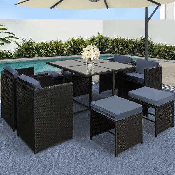 Black wicker outdoor dining table from hawaii gardeon 9pc set with high density foam seats