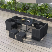 Horrocks 8 seater rattan garden furniture set with wine glass on table