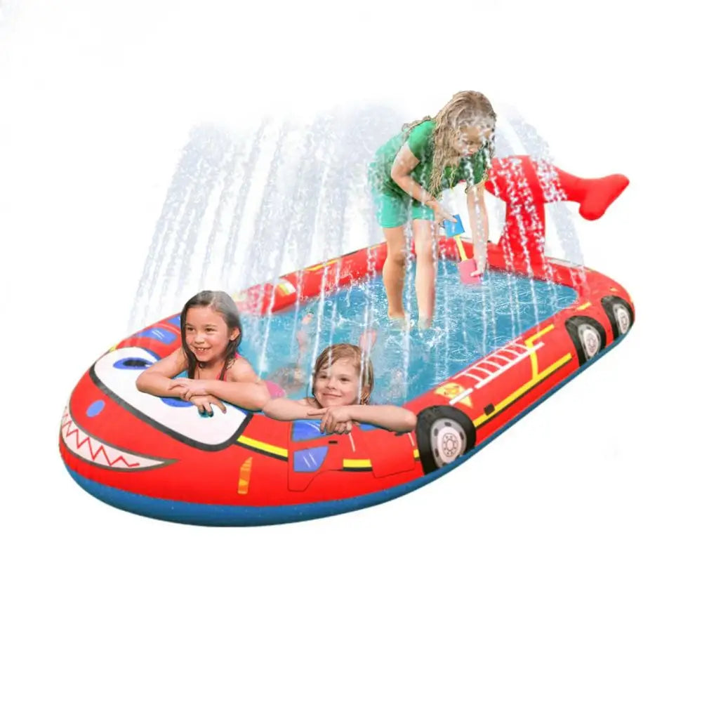 Kids enjoying red and blue inflatable boat in inflatable sprinkler pool for kids - fire engine