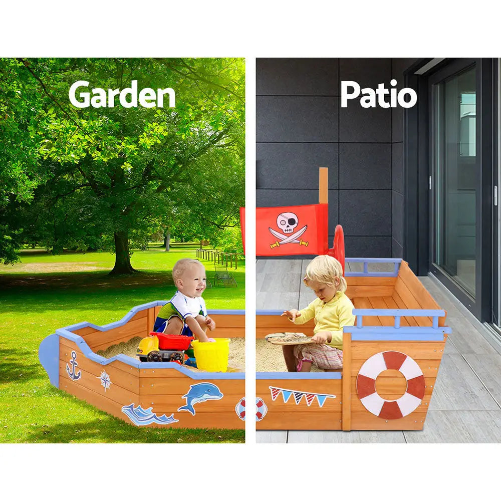 Child playing in boat-shaped sand pit toy outdoor sandbox