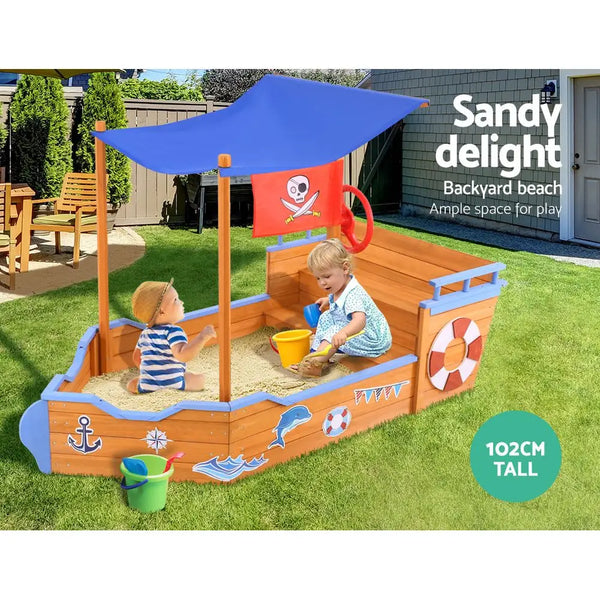 Child playing in boat-shaped sand pit with umbrella - keezi kids sandpit wooden boat with canopy bench seat 165cm