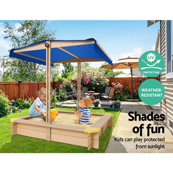 Keezi kids wooden sand pit with canopy, child playing under blue umbrella