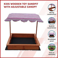 Delightful canopy-covered sandpit with black mat