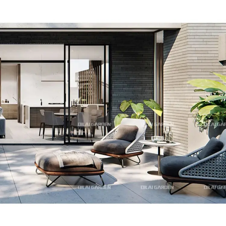 Modern outdoor seating area with chairs and a table in a stylish home setting.