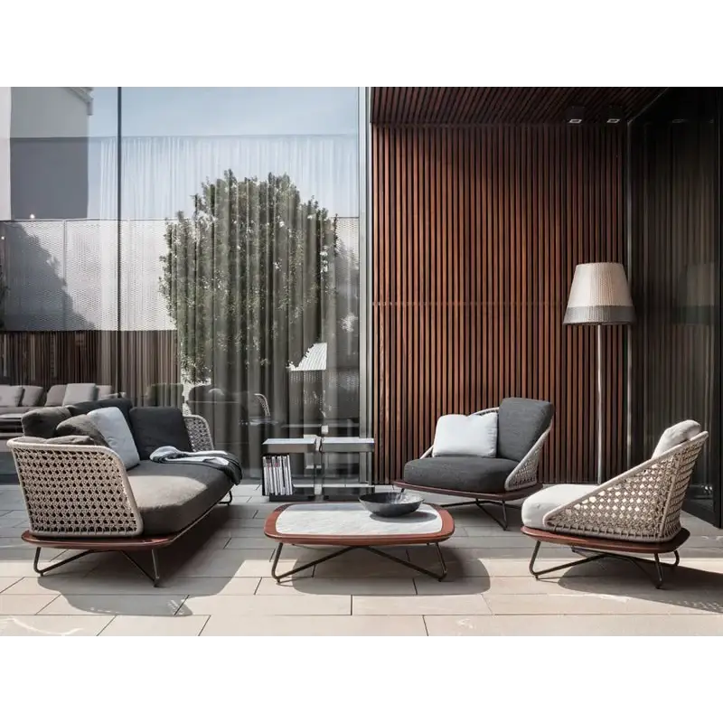 Outdoor furniture set with chairs and a table on a patio, featuring the DILAI GARDEN brand.