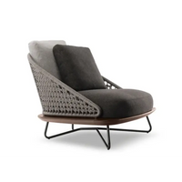 Modern lounge chair with gray cushion and wicker backrest on a white background, featuring QILAI GARDEN branding.