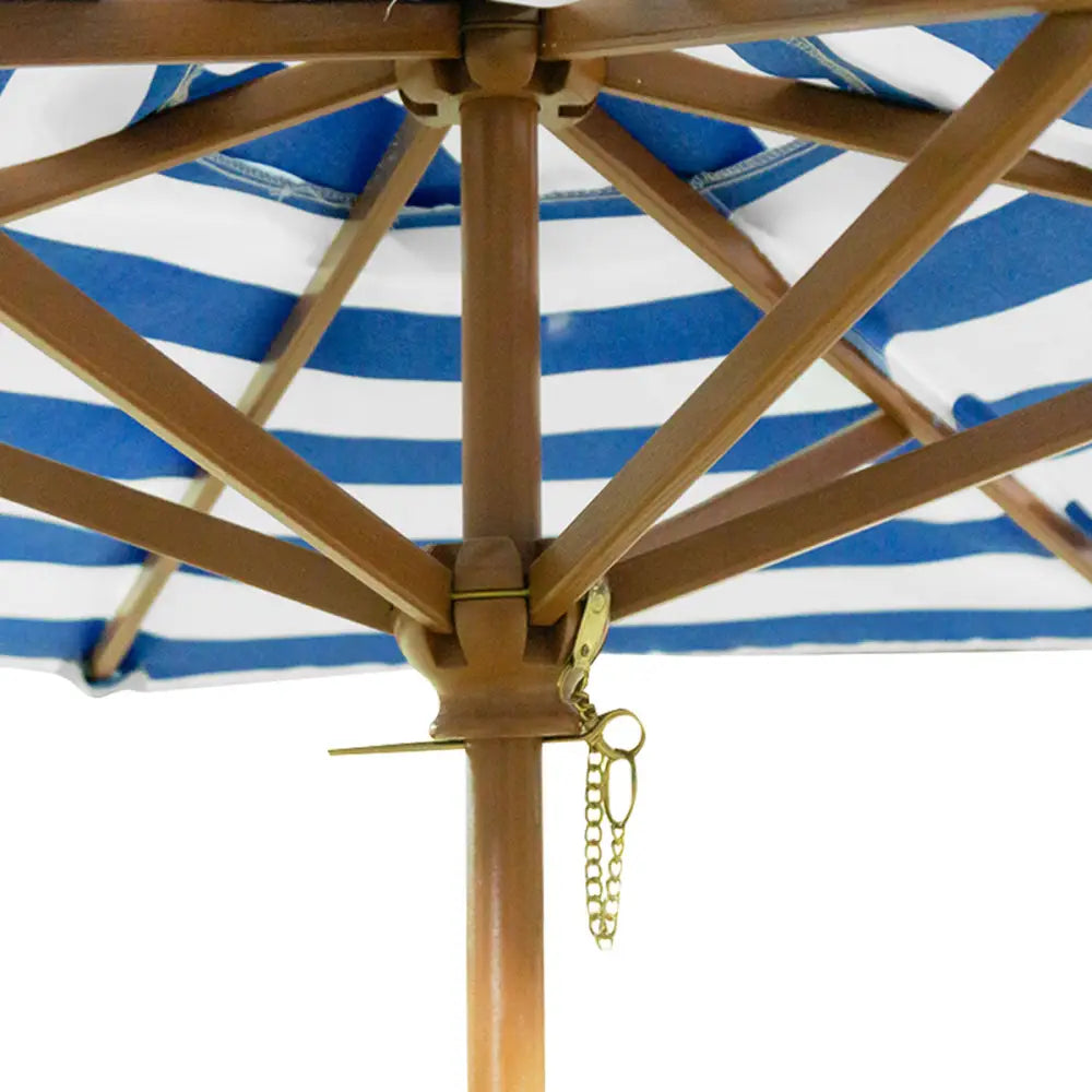Blue and white striped umbrella with chains on lifespan kids sunrise sand & water table