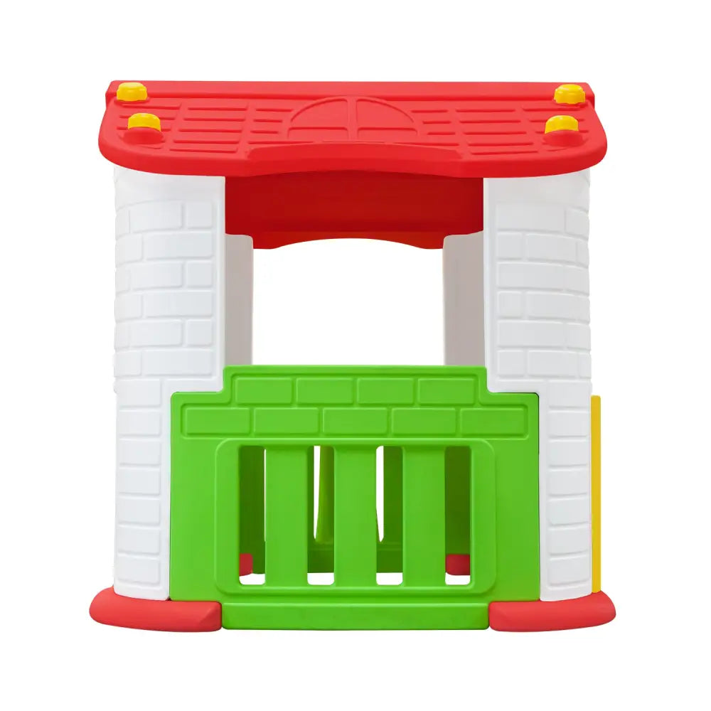 Lifespan kids wombat 2 playhouse: small red-roofed playhouse with green door in a fairy-tale world