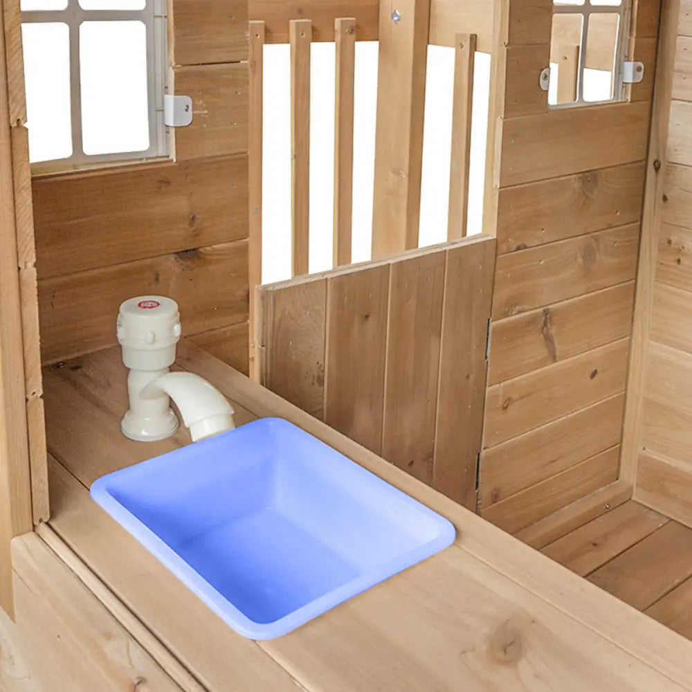 Blue sink in wooden bathroom of lifespan kids wooden silverton cubby play centre with 1.8m slide